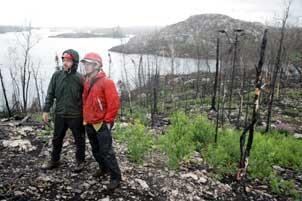 Roy Rich and Nick Fisichelli examine the landscape one year after the Cavity Lake burn of 2006